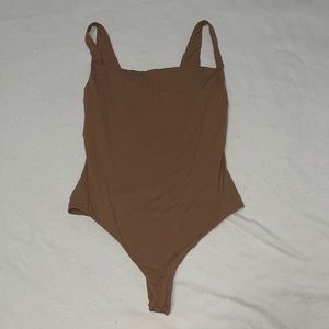 SKIMS body suit
